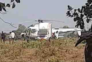 private-company-helicopter-landing-at-gunasada-village-of-songarh